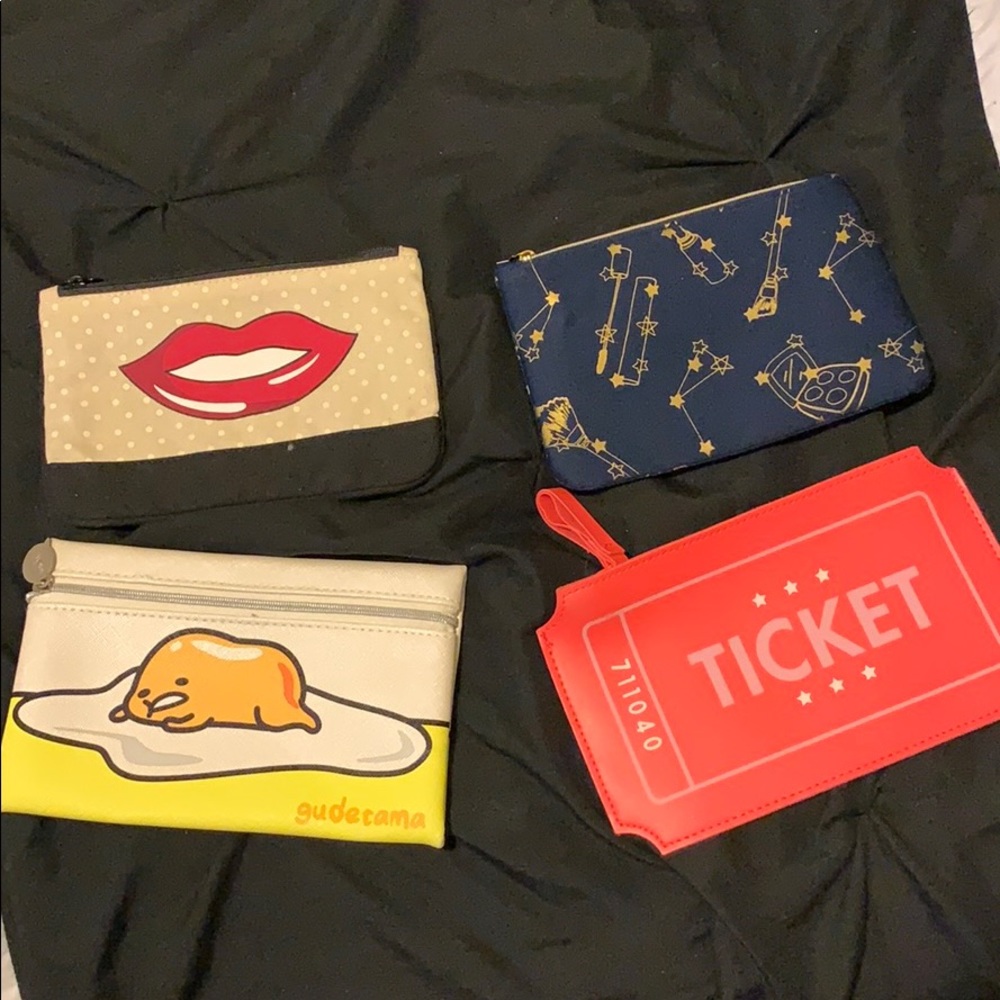 4 piece Ipsy makeup bags